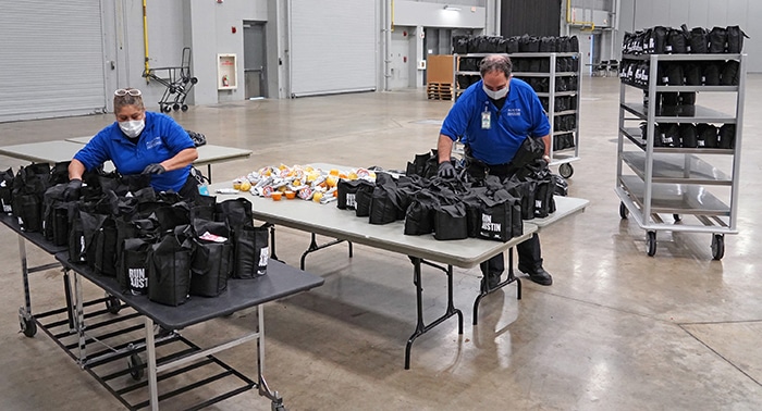 Austin Convention Center staff helped prepare meals for distribution to shelters and emergency teams